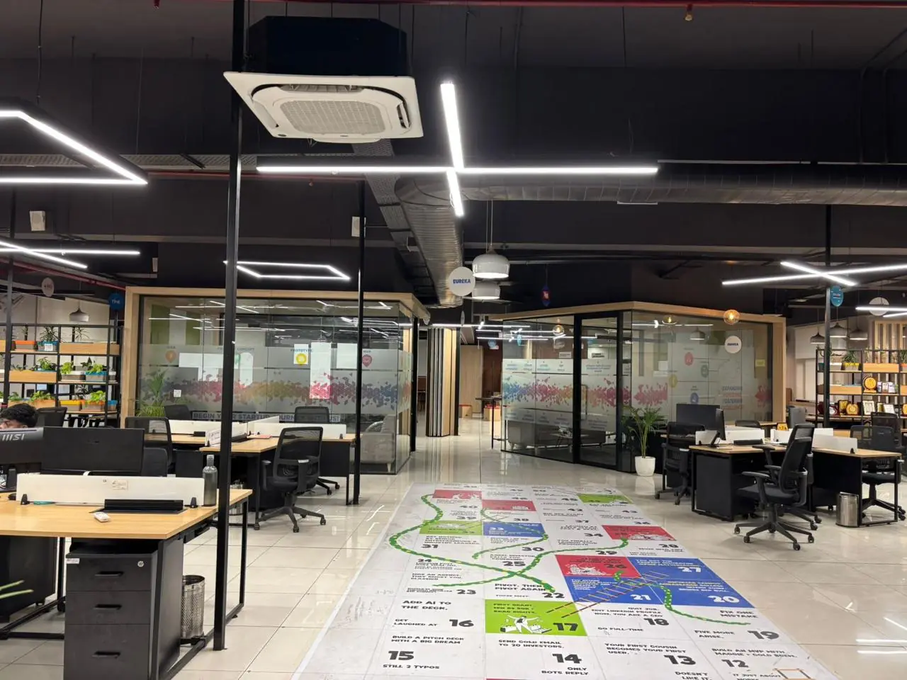 Glass-walled meeting rooms at Seven Wealth’s Aerocity, Mohali office