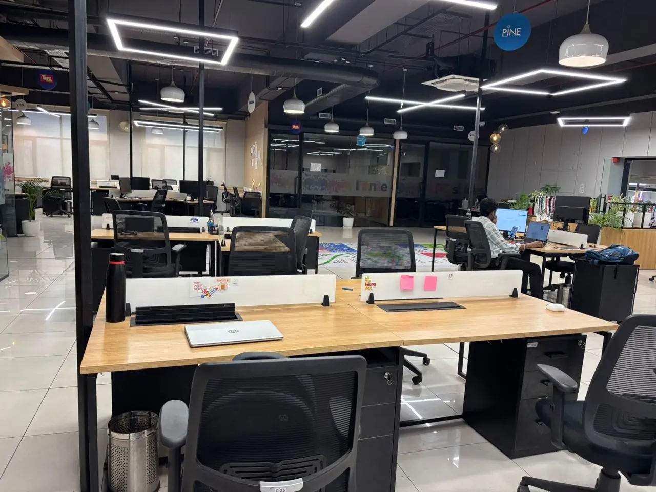 Seven Wealth team workspace with dual-monitor desks at the GMADA Aerocity, Mohali office